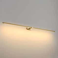 a wall mounted light with a dimmer on the side and a long arm that is attached to it