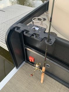 a fishing rod is hooked up to the back end of a boat's door