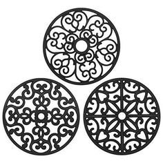 three circular cut outs are shown in black and white, each with an intricate design