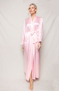 Exude elegance through your morning and nighttime routines in this luxurious robe sewn from fluid silk. Shawl collar Long sleeves Front patch pockets Removable tie belt 100% silk Dry clean Imported Pink Silk Robe, Luxury Sleepwear, Classic Pajamas, Silk Robe, Luxury Silk, Womens Robes, Cotton Pyjamas, Best Of The Best, Fine Fabric