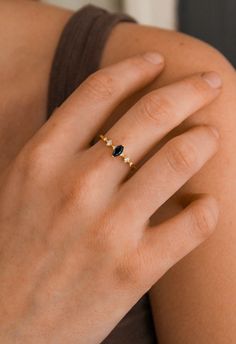 For a luxurious and sensual design, look no further than our breathtaking Ava luxe black onyx ring. Our team has handcrafted each ring with the finest materials, coupled with a gorgeous natural black onyx centerpiece and six perfectly round, natural crystals. A gentle design that’s easy on the eye and gorgeous, you’re sure to fall in love with this ring for any outfit. ✦ DETAILS ✦ ✧ 0.75 Carat center stone ✧ Natural black onyx and crystals ✧ Sizes 3.25-11.25 US ✧ This ring set will arrive ready Black Onyx Ring Gold, Ava Black, Black Stone Ring, Gold Jewelry Simple Necklace, Onyx Jewelry, Gold Jewelry Simple, Black Onyx Stone, Black Onyx Ring, Black Jewelry