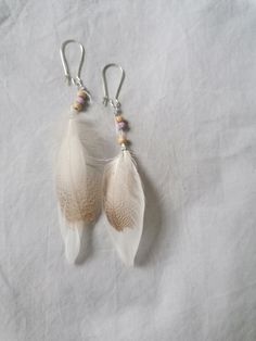 Hand made earrings with White feathers and wooden beads. White Feather Earrings, Diy Feather Earrings, Feather Earrings Diy, Eagle Earrings, Beauty Photoshoot, White Feather, Feather Jewelry, White Feathers, Earrings White