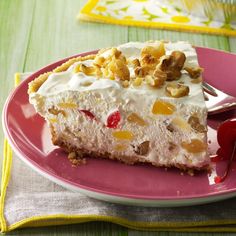 a piece of pie on a pink plate with a fork