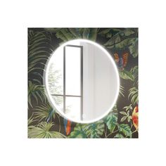 a mirror that is in the middle of a wall with plants and birds on it