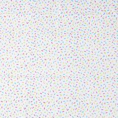 a white background with multicolored sprinkles