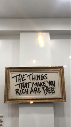 there is a sign that says the things that make you rich are free on the wall