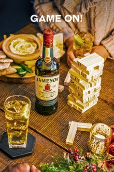 a bottle of jameson sitting on top of a wooden table