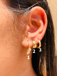 18kt Gold Filled Mini Hoop Earrings. The perfect ear stack.  Nickel Free- Waterproof- Tarnish Resistant- Hypoallergenic Price per hoop- Also sold as set Option 1: Hoop Size: 11mm Drop: Approx 14mm Option 2: Hoop Size: 10mm Width: 2mm Option 3: Hoop Size: 12mm Width: 5.5mm Experience the beauty and durability of 18 Karat Gold Filled. Our pieces are crafted with a thick layer of genuine 18 Karat gold bonded to a base metal, ensuring a long-lasting and high-quality piece of jewelry. Unlike gold-pla Huggie Earrings With Dangling Charms, Gold Drop Huggie Earrings Hypoallergenic, Gold Huggie Earrings With Dangling Charms For Everyday, Gold Drop Huggie Earrings For Everyday, Delicate Gold-plated Huggie Earrings, Everyday Gold Huggie Earrings With Dangling Charms, 14k Gold-filled Huggie Earrings With Dangling Charms, 14k Gold Filled Huggie Earrings With Dangling Charms, Dainty Gold Teardrop Huggie Earrings