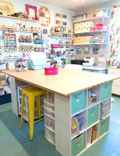 an organized craft room with lots of storage