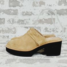 New Toe Shape Round Toe Closure Slip On Us Shoe Size 5 Occasion Casual, Workwear Platform Height .75 In Heel Height Mid (2-2.9 In) Department Women Outsole Material Rubber Style Mule Features Comfort, Cushioned Season Fall, Spring, Summer, Winter Pattern Solid Lining Material Suede Color Beige, Black Brand Eileen Fisher Type Heel Heel Style Block Model Eileen Fisher Hiya Shoe Width Standard Upper Material Suede Insole Material Leather Beige Slip-on Mules With Stacked Heel, Casual Beige Block Heel Mules, Spring Mules With Rubber Wedge Heel, Beige Slip-on Clogs For Spring, Beige Wedge Heel Clogs For Spring, Beige Suede Clogs With Round Toe, Spring Mules With Rubber Sole And Medium Width, Beige Platform Slip-on Mules, Slip-on Brown Clogs For Spring