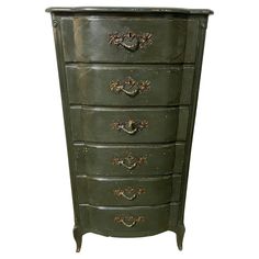 an antique green painted chest of drawers