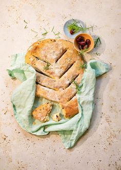 a piece of pie sitting on top of a green cloth