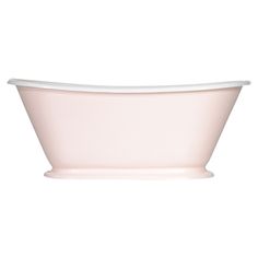 a pink bath tub sitting on top of a white counter