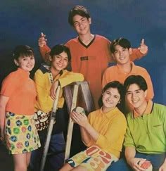 a group of young people posing for a photo