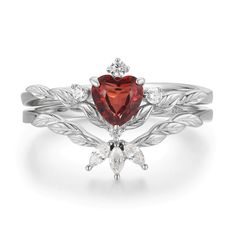 Radiating warmth and love is our Flaming Heart Red Garnet Ring Set© that unveils a heart-shaped red garnet gem at the center of a silver leaf patterned band with a matching topaz stacking ring to add a perfect splendor. A glimmering set that serves as a beautiful reminder to know your worth, spread love, and make a difference. It is also a perfect and timeless symbol of love with a promise to stay forever. ✦ Available in both 14K white gold vermeil (14K white gold plated over a sterling silver b Red Heart-shaped Birthstone Ring, Dnd Wedding, Bff Rings, Heart Engagement Ring, Red Gemstone Ring, Heart Shaped Ring, Flaming Heart, Heart Engagement, Red Garnet Ring