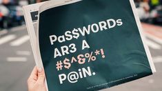 a person holding up a sign that says passwords are a $ 4 98 / % point