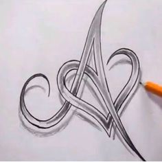 the letter a is drawn in pencil with a pen on top of it and an orange marker