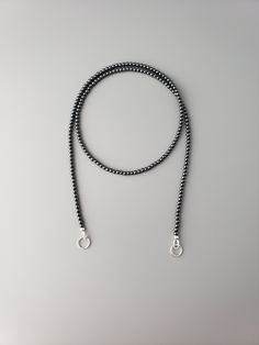 "These are 2mm round smooth black Hematite beads. Sterling silver metal. Outside diameter of the rings is 7mm, inside is approx 5,5mm. The length is 18\". If you need different length (15\"-24\") please leave  a note at the checkout or contact me. All items are strung on the high quality stringing wire.  Carabiner necklaces  https://www.etsy.com/shop/CrystalRise?search_query=Carabiner Hematite jewelry  https://www.etsy.com/shop/CrystalRise?search_query=Hematite Link to the shop  https://www.etsy.com/shop/CrystalRise" Sapphire Necklace Gold, Carabiner Necklace, Pyrite Bracelet, Hematite Jewelry, Malachite Earrings, Blue Sapphire Necklace, Azurite Malachite, Agate Earrings, Hematite Beads