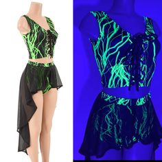 "This neon set includes a lace up crop tank, and high waist siren shorts with a black mesh hi lo overskirt. It lights up like crazy under UV blacklight! Sheer mesh overskirt is 36\" long in the back. Made to order, ships out within five days of purchase. Womens Sizing (See below for instructions on where measurements should be taken) XXS: Bust 29\"-30\" / Waist 22\"-23\" / Hips 30\"-32\" Extra Small: Bust 31\"-32\" / Waist 24\"-25\" / Hips 33\"-35\" Small: Bust 33\"-34\" / Waist 26\"-28\" / Hips Summer Party Crop Top, Rave Swimwear For Night Out In Summer, Rave Bottoms For Summer Night Out, Summer Rave Bottoms For Night Out, Stretch Dancewear Crop Top For Summer, Rave Style Bottoms For Summer Night Out, Summer Stretch Dancewear Crop Top, Stretch Summer Dancewear Crop Top, Summer Dancewear Shorts With Built-in Liners