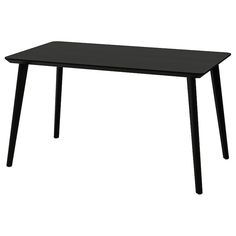 a black table sitting on top of a white floor