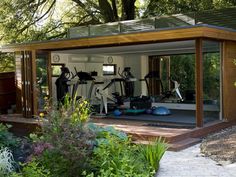 a home gym with exercise equipment in the backyard