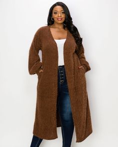 This cardigan is perfect for making a statement! Its soft and luxe fabric, duster length, hidden side pockets, and flowy bishop sleeves make it an absolute must-have. You'll be sure to turn heads in this stylish piece! This plus size outerwear is a must in your everyday wardrobe L I V D Serilda Faux Feather Cardigan | Brown | Jackets | Materials & Care Instructions: ['100% Polyester', 'Hand wash', 'Made in USA'] Brown Cardigan Outfit Fall, Brown Cardigan Outfit, Feather Cardigan, Cardigan Fall Outfit, Plus Size Cardigan, Cardigan Outfit, Cardigan Brown, Sweaters And Cardigans, Brown Cardigan