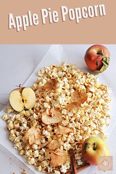 an apple pie popcorn with apples and cinnamon on the side, in front of it