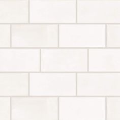 a white brick wall with no mortars on it