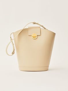 Vivian in Ivory Leather Designer Everyday Bucket Bag, Timeless Office Bucket Tote Bag, Timeless Bucket Bag With Detachable Strap And Top Handle, Elegant Bucket Bag With Gold-tone Hardware For Everyday Use, Cream Bucket Bag With Detachable Strap For Office, Everyday Beige Bucket Bag With Handle Drop, Beige Double Handle Bucket Bag For Evening, Designer Cream Bucket Bag For Daily Use, Timeless Bucket Bag With Removable Pouch