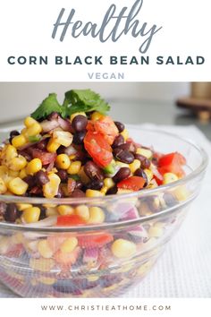 a bowl filled with corn and black bean salad