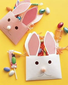 paper bag with bunny ears and candy sticks