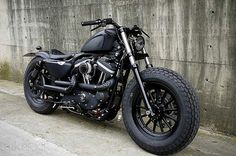 So is the case with the 2009 Harley-Davidson Sportster Iron 883 that was turned into a beast by a Taiwenese shop called Rough Crafts that likes to call it the Iron Guerilla. Iron 883 Bobber, Harley-davidson Sportster, Harley 48, 883 Iron, E90 Bmw, Motorcycle Exhaust Pipes