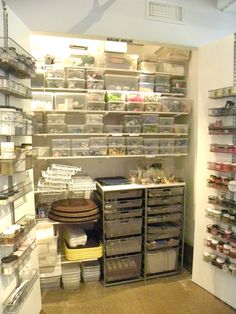 a room filled with lots of shelves and bins