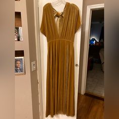 Micah Convertible Velvet Dress (Color: Mustard - 603, Size: M, Length: Petite Maxi: 41 In Waist To Hem) This Dress Was Used Once For A Wedding. The Bandeau Top Was Never Used And Still Has The Tag. Great Condition, The Only Evidence Of “Wear” Is A Tiny Pinhole From Where I Had To Insert A Safety Pin. I’ve Included Pictures For Reference. Payed $200 Asking For $100 Obo. The Micah Velvet Convertible Dress Is Versatile For Any Bridal Party Lineup. This Dress Features Plenty Of Styling Options From Formal Yellow Maxi Dress, Yellow V-neck Maxi Dress For Formal Occasions, Yellow V-neck Maxi Dress For Evening, Yellow V-neck Maxi Dress For Cocktail, Yellow Floor-length Dress For Night Out, Mustard V-neck Party Dress, Chic Mustard Maxi Dress For Party, Mustard Maxi-length Dress For Party, Mustard Maxi Length Party Dress