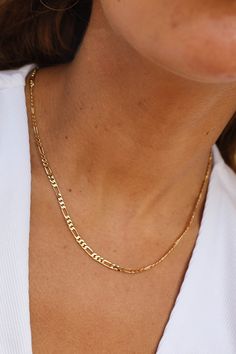 Dainty Gold Figaro Chain perfect to add a pendant charm to or wear with other chain in a stack. 3.3mm 17.5 inch Necklace Gold Filled Elegant Figaro Chain Link Charm Necklaces, Elegant Figaro Chain Link Charm Necklace, Elegant Charm Necklaces With Figaro Chain, Figaro Chain Choker Jewelry As Gift, Figaro Chain Choker Jewelry For Gift, Everyday Jewelry With Figaro Link Chain, Everyday Figaro Chain Link Jewelry, Everyday Figaro Link Chain Jewelry, Dainty Pendant Chain Necklace With Figaro Chain