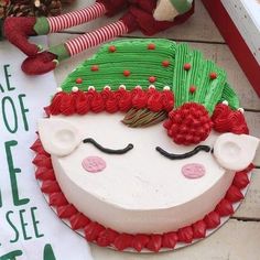 a decorated cake sitting on top of a table