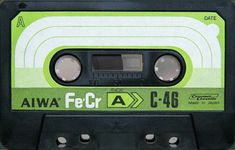 an old black and green tape recorder with the words ava fer a c - 60 on it