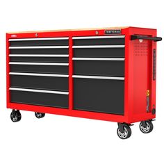 a red tool cabinet with two drawers on wheels