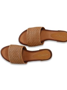 This sandal has such a sustainable story behind it! This is made from 100% recycled and reclaimed materials, originally abandoned by the original maker. We see the beauty in this style and have re-branded it to give it a new life!It is a classic summer staple- with an itty-bitty stacked heel. Rich brown leather weaves together for a multi-dimensional look. Can be dressed up or down. Antique hand-burnished finished on the edge of the leather insole sole adds a vintage vibe. The sole is less flexi Brown Summer Mules For Everyday Wear, Brown Flip Flops With Removable Insole For Everyday, Comfortable Everyday Brown Sandals, Comfortable Brown Everyday Sandals, Summer Sandals With Removable Insole In Natural Color, Comfortable Brown Sandals With Textured Sole, Brown Open Toe Flip Flops For Everyday, Brown Leather Sandals For Summer Outings, Everyday Brown Open Toe Flip Flops