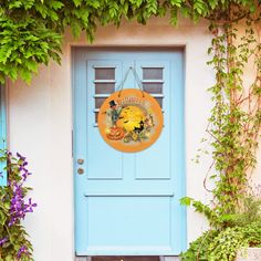 there is a blue door with a sign on it