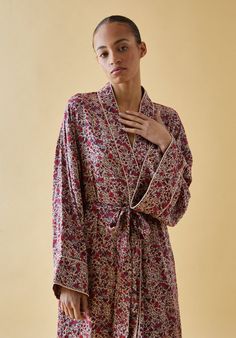 New to our nightwear, the Corina robe is a beautifully oversized dressing gown. Designed to be worn over our best selling pyjamas. It's inspired by the kimono and features wide sleeves with piping details. Pairs beautifully with our new night dress and a great gift.   Composition: 100% Viscose Satin Cool machine wash only. Wash inside out and with similar colours 100% Viscose satin, Cool machine wash only. Wash inside out and with similar colours