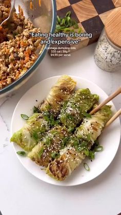 an image of food that is on the table with chopsticks in front of it