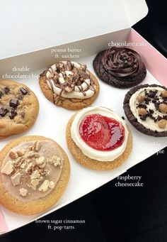 a box filled with different types of cookies