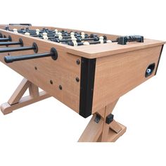 an image of a foosball table that is made out of wood