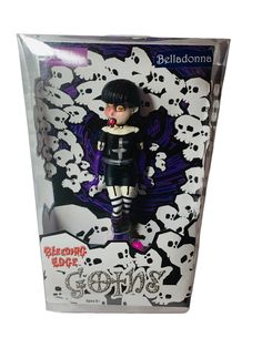 a doll in a box with skulls on it