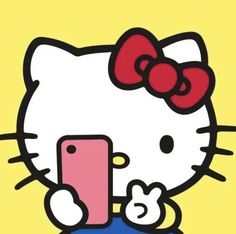 an image of a hello kitty holding a cell phone