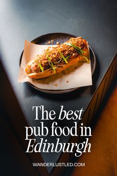 the best pub food in edinburgh, with an image of a hot dog on a plate