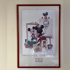 a mickey mouse painting hanging on the wall