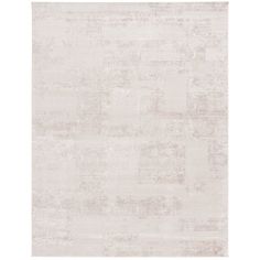 a white rug with an abstract design on the top and bottom, in shades of beige