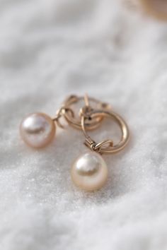 These elegant, creamy South Sea Pearl earrings, destined to become your most cherished pearls. Classy yet casual, they boast a beautiful champagne color that complements any occasion. Their slight oval shape ensures each pair is unique, making them extra special - just the way it should be. Suspended on, thick real  14 k gold fill hoops with a secure clip-back closure. Please note that each pearl and shell are inherently unique. While I strive to carefully match them to the ones depicted in the images, variations may naturally occur due to their individual characteristics. Because each piece of jewelry is handmade with care, please allow time for shipping Elegant Beige Teardrop Jewelry, Elegant Beige Teardrop Earrings, Champagne Jewelry, South Sea Pearls Earrings, Gold Filled Hoops, Sea Pearl, Light Academia, South Seas, Sea Pearls